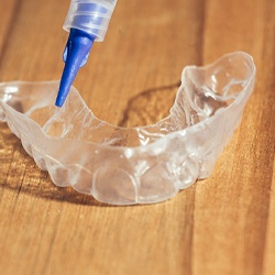 take-home teeth whitening trays sitting on a countertop