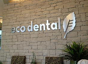 Eco Dental logo on office wall